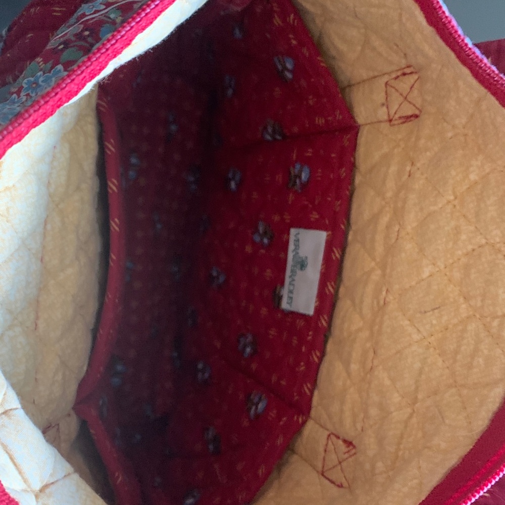 Vera Bradley small bag. Zippered top with outside compartment.  Red pattern
